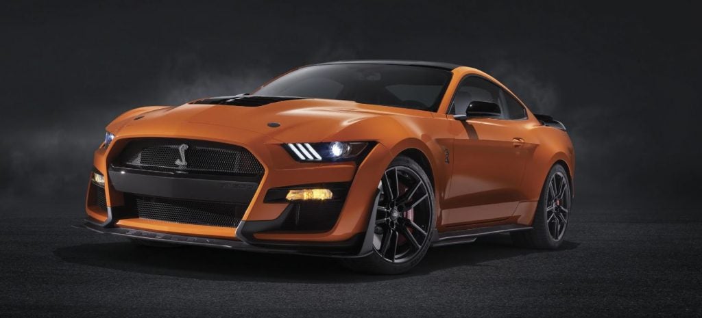 A parked orange 2021 Ford Mustang. | Ford dealer in Jacksonville, AR.