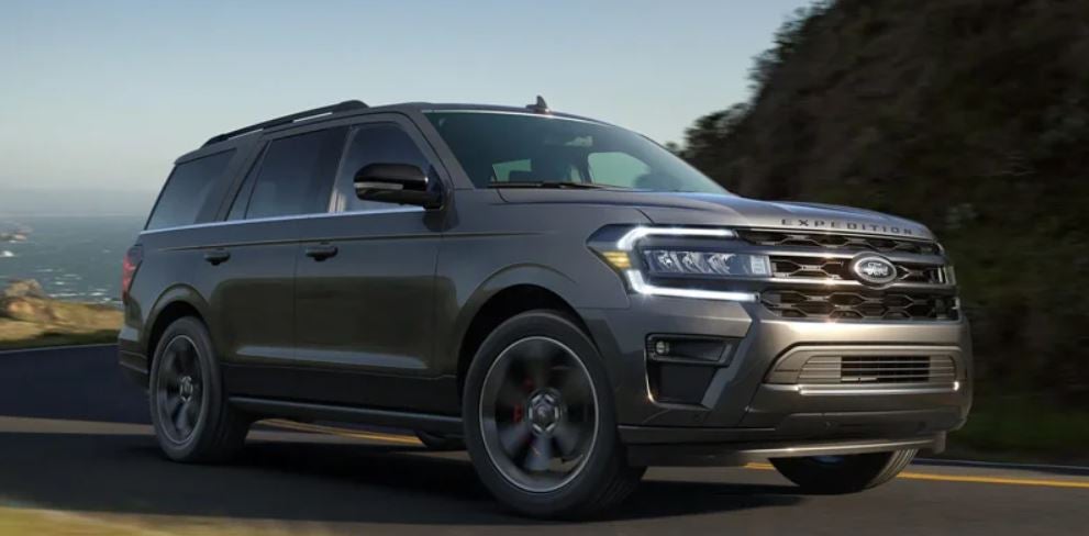 A gray 2022 Ford Expedition being driven on the highway. | Ford dealer in Jacksonville, AR.