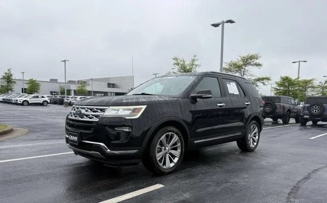 Black Ford Explorer Certified Pre-Owned SUV parked at Crain Ford of Little Rock dealership lot