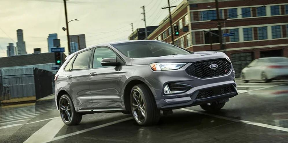 A silver 2022 Ford Edge parked in a parking lot. | Ford dealer in Little Rock, AR.