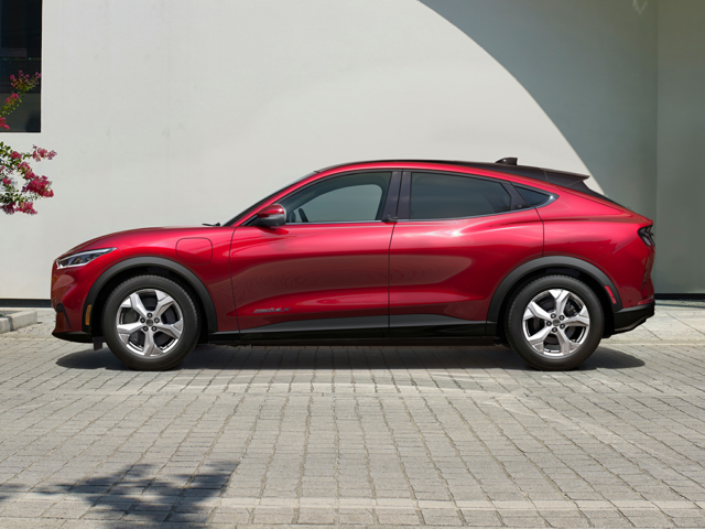 Profile view of a red 2023 Ford Mustang Mach-E. | Ford dealer in Little Rock, AR | Crain Ford of Little Rock