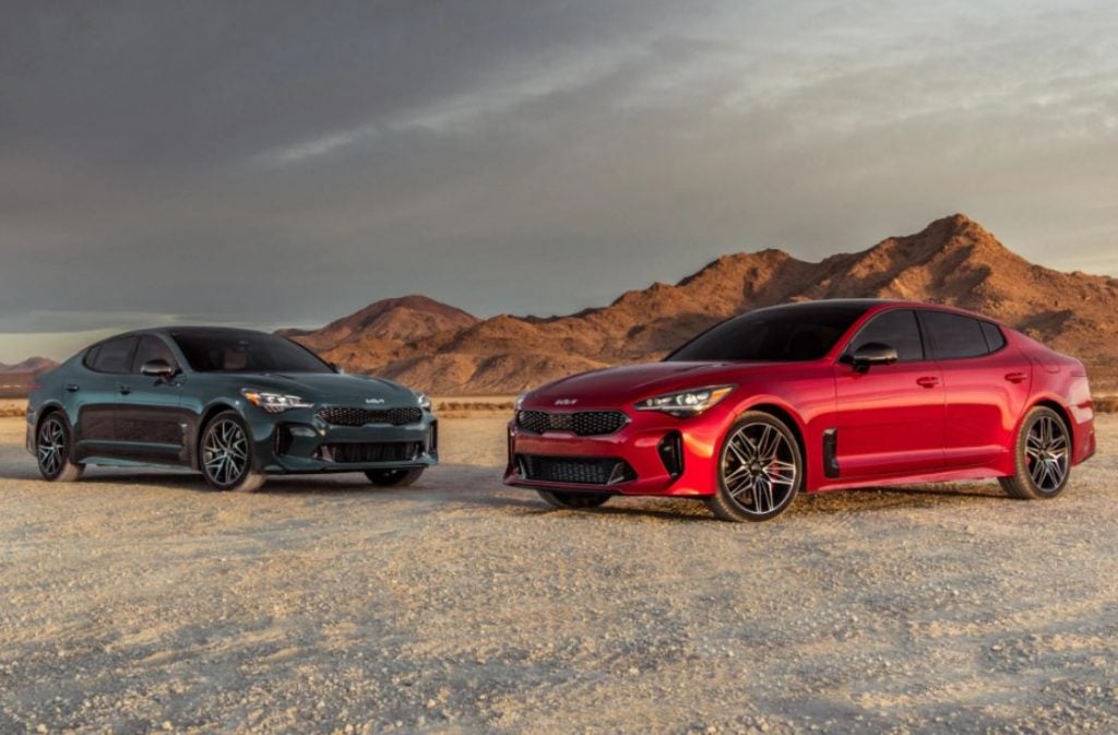 Two 2022 Kia Stingers parked facing each other. | Kia dealer in Conway, AR.