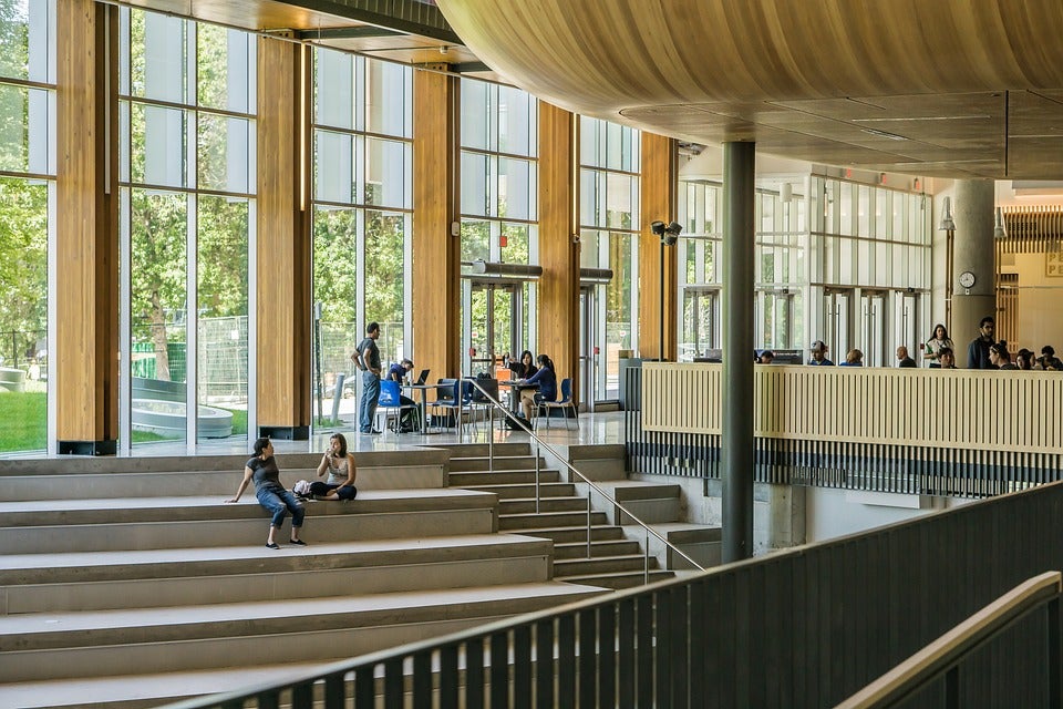 Students gathered in different areas of a large university building. | Tourist attractions around Conway, AR.