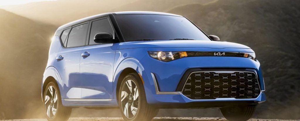 A parked, light blue 2023 Kia Soul. | Kia dealer in Bentonville, AR.