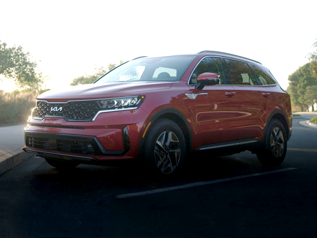 A red 2023 Kia Sorento Hybrid parked in a parking spot. | Kia dealer in Bentonville, AR | Crain Kia of Bentonville