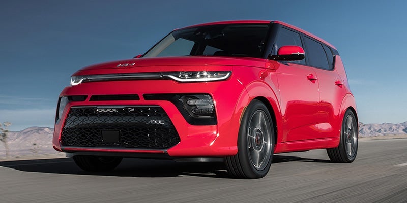 A red, 2022 Hyundai Soul being driven on the highway. | Hyundai dealer in Bentonville, AR.