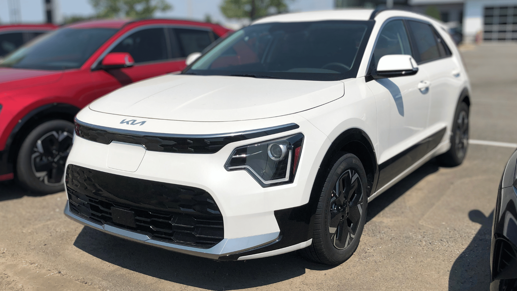 Photo of a White 2025 Kia Niro EV, front view.