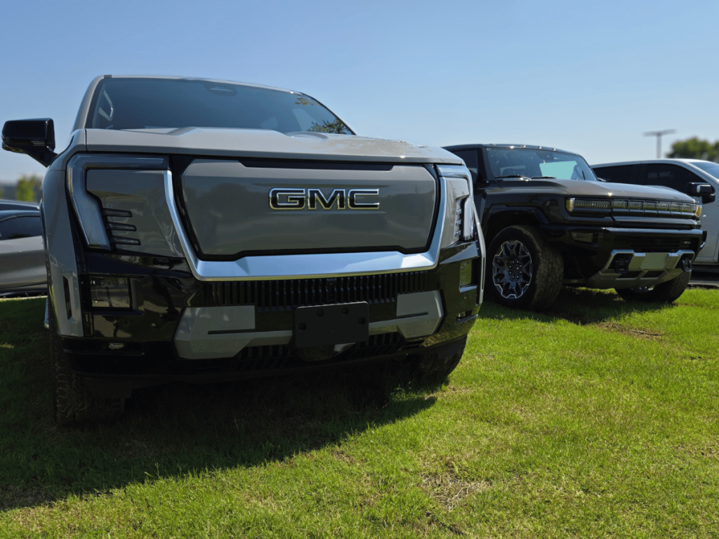 GMC Sierra EV and Hummer EV at Crain Kia of Bentonville