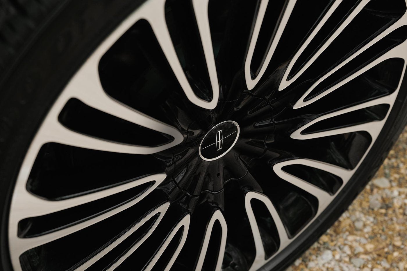 Close view of a black and chrome multi spoke wheel on a Lincoln Aviator Black Label