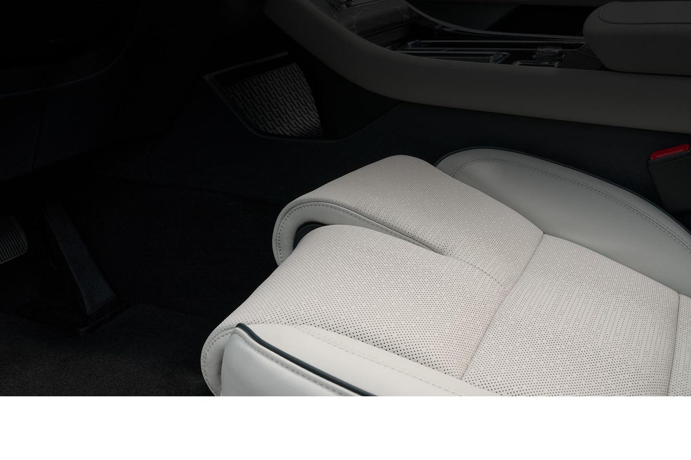 Light gray leather front seat inside a Lincoln Aviator
