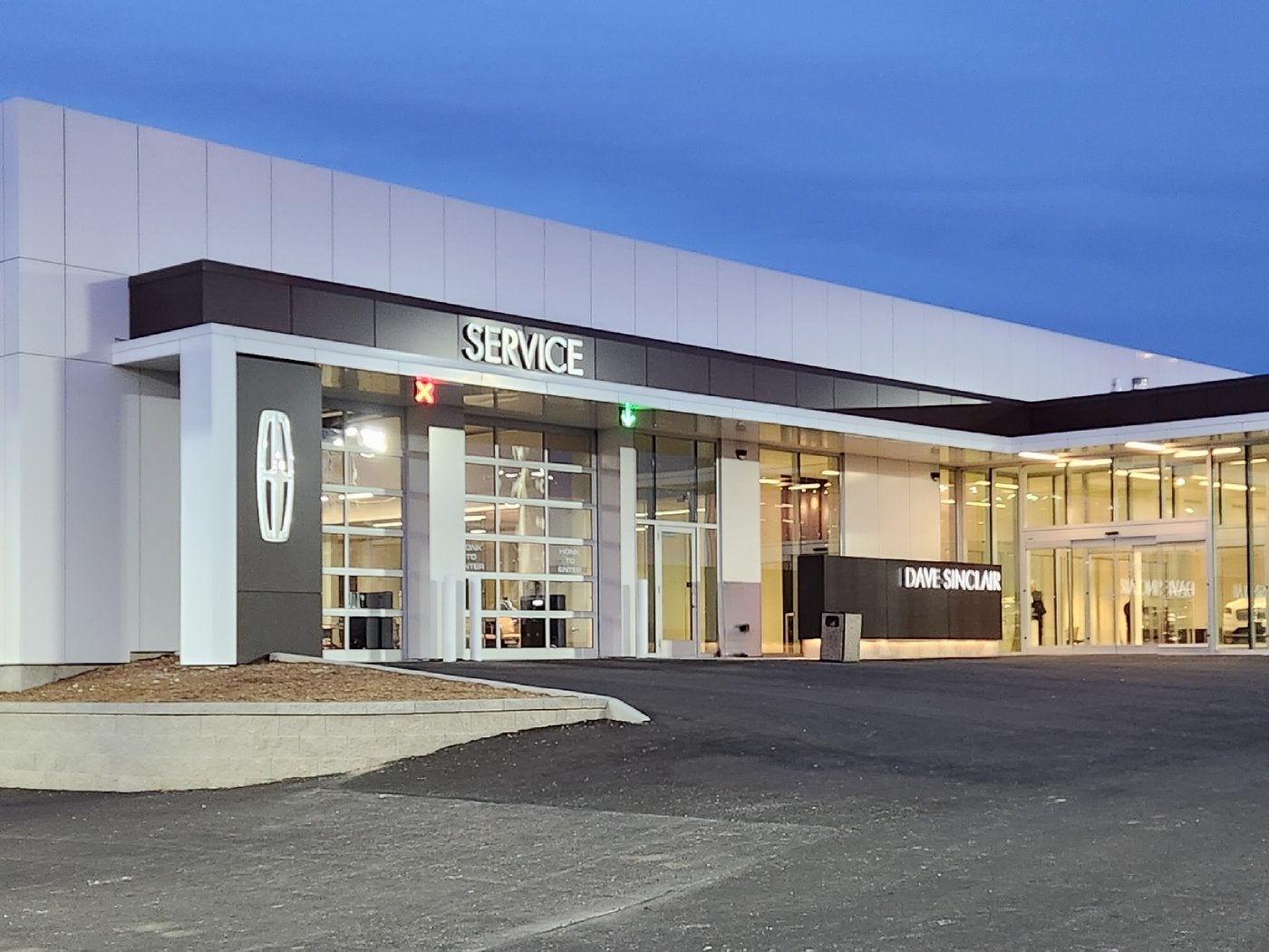 Service entrance at Dave Sinclair Lincoln St. Peters at dusk for Washington MO owners