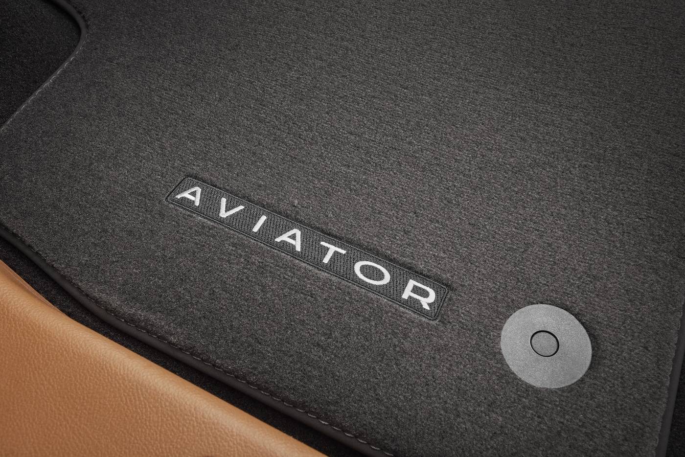 Lincoln Aviator carpeted floor mat with the Aviator name on it