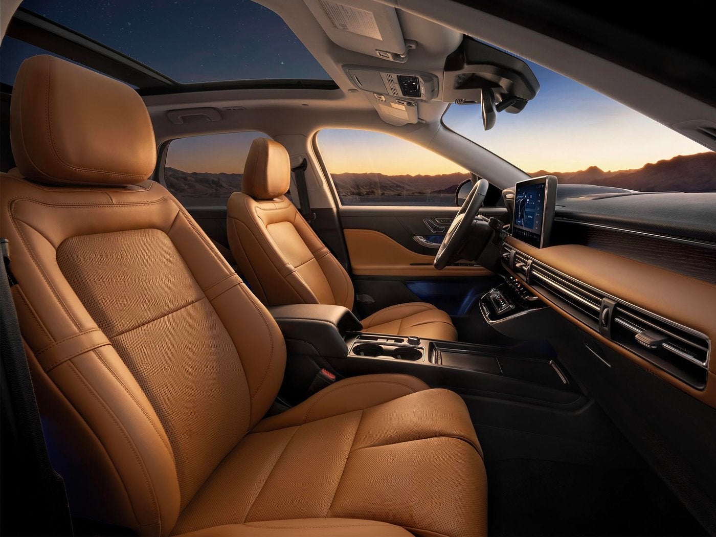 Lincoln Corsair front seats in tan leather seen through the open door