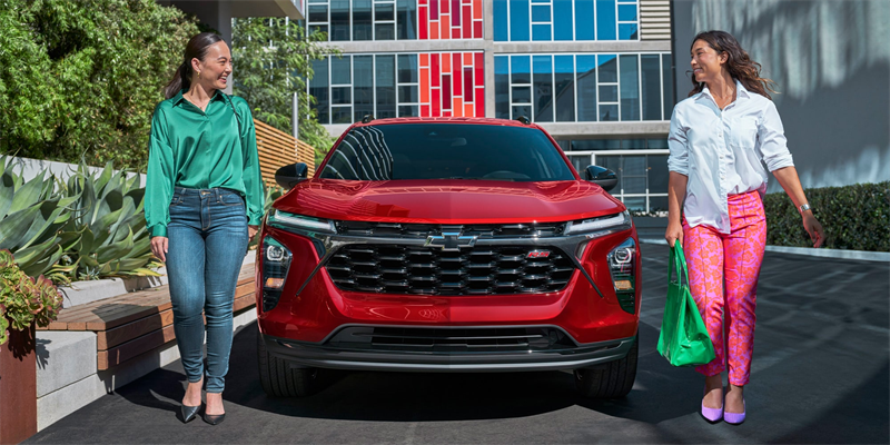 Two women with 2026 Chevy Trax front angle