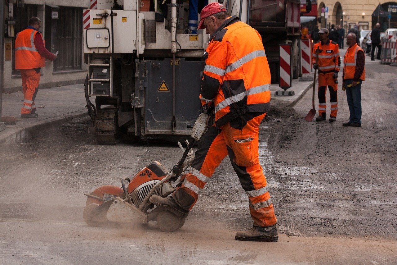 Construction man working on the road