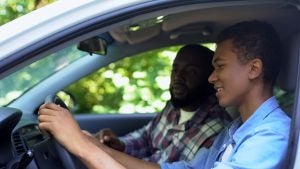 Caring,Parent,Teaching,Son,How,To,Drive,Car,,Spending,Time | Glenview, IL