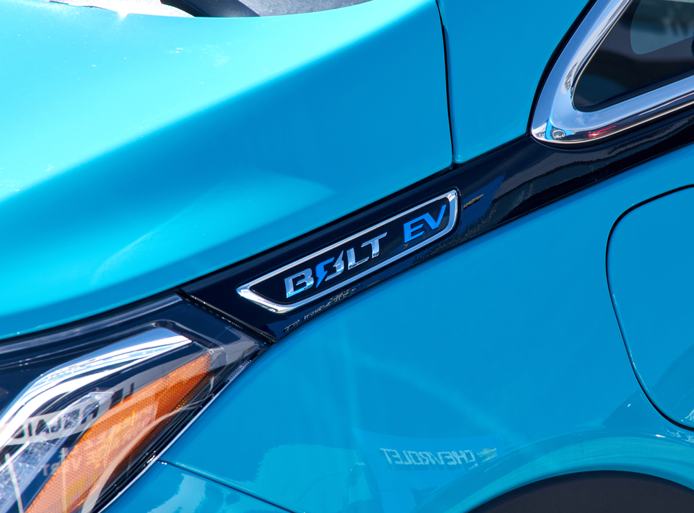 close view of blue 2021 chevy bolt side