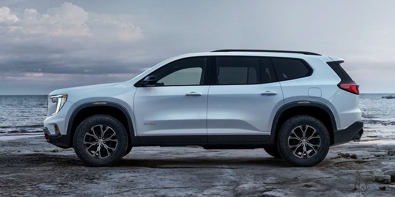 2026 White GMC Acadia in it's side profile