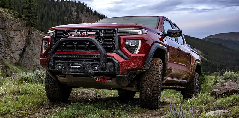 A photo of a 2025 GMC Canyon offroading.