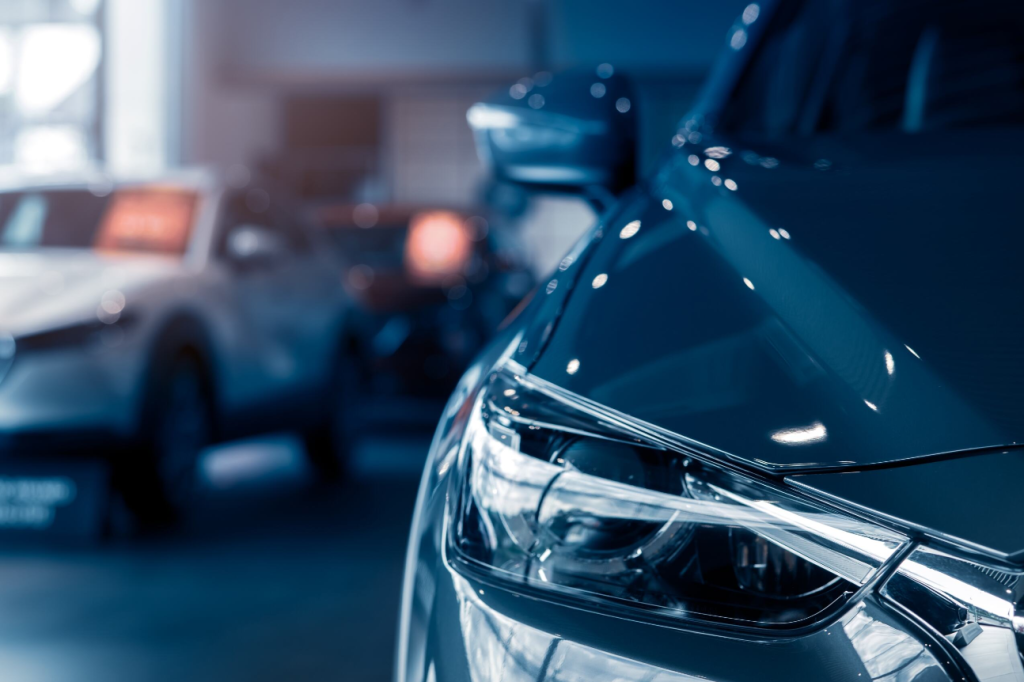A photo of the inside of a car dealership.