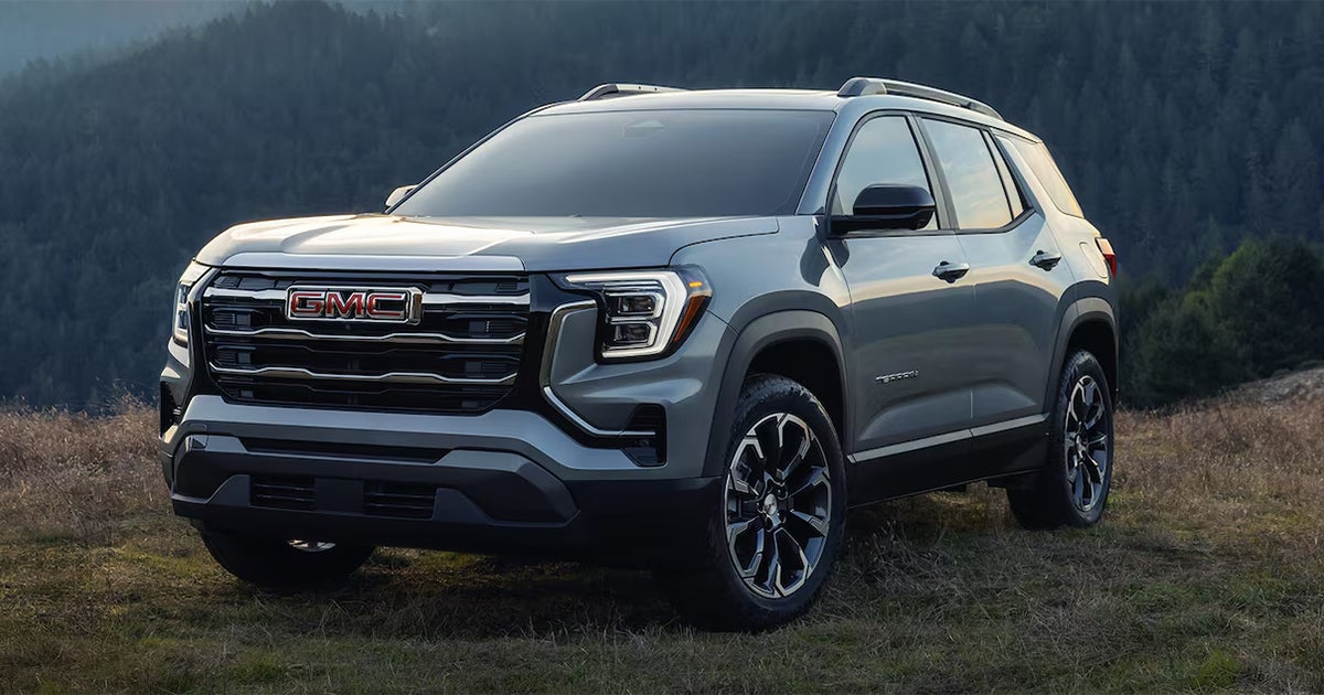 A GMC Terrain Elevation parked off-road in the mountains.