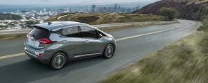 Silver 2021 Chevrolet Bolt EV driving on the open roads.