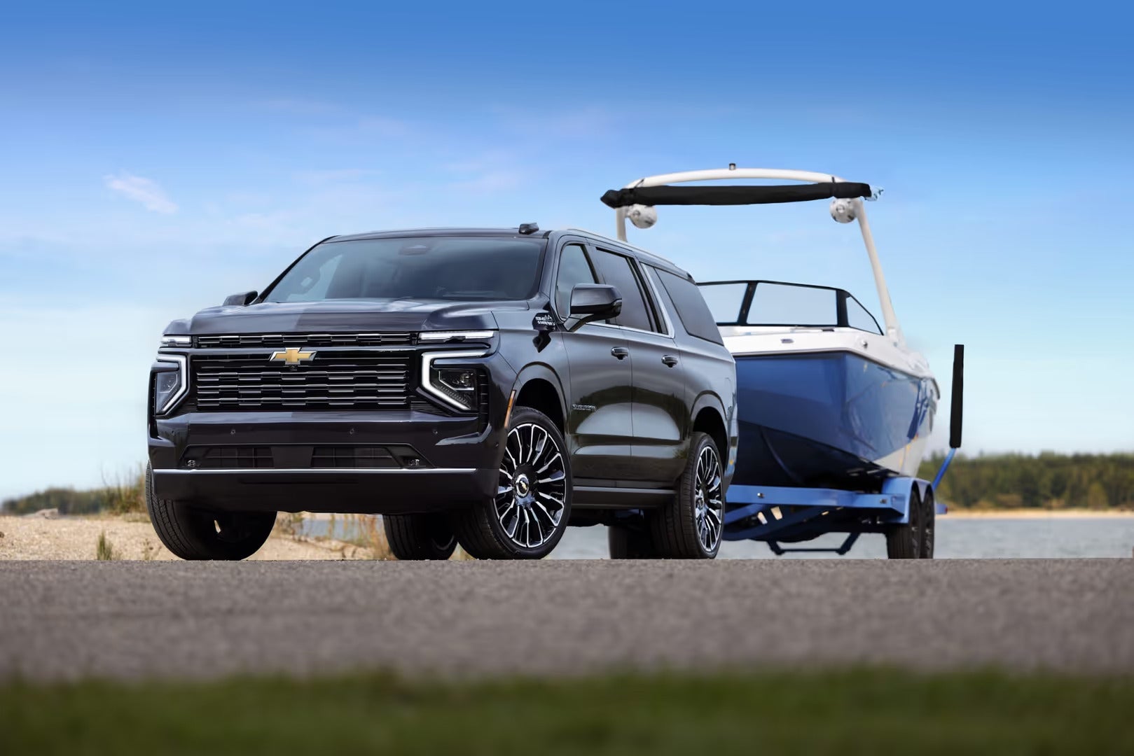 2026 Chevrolet Suburban towing a boat