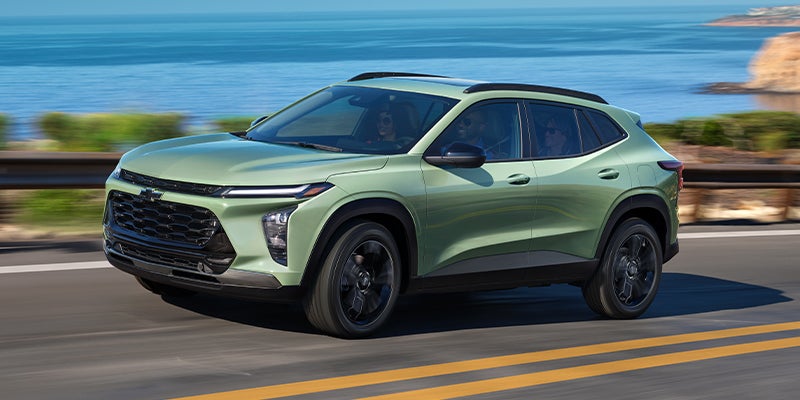Green Chevrolet Trax Along Beach Side