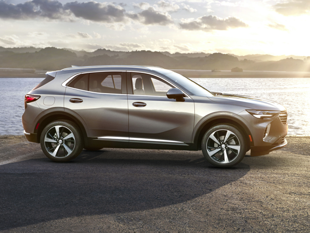 A silver Buick Envision driving outside