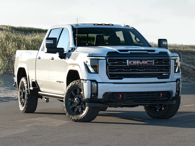 A white GMC 2500HD parked outdoors