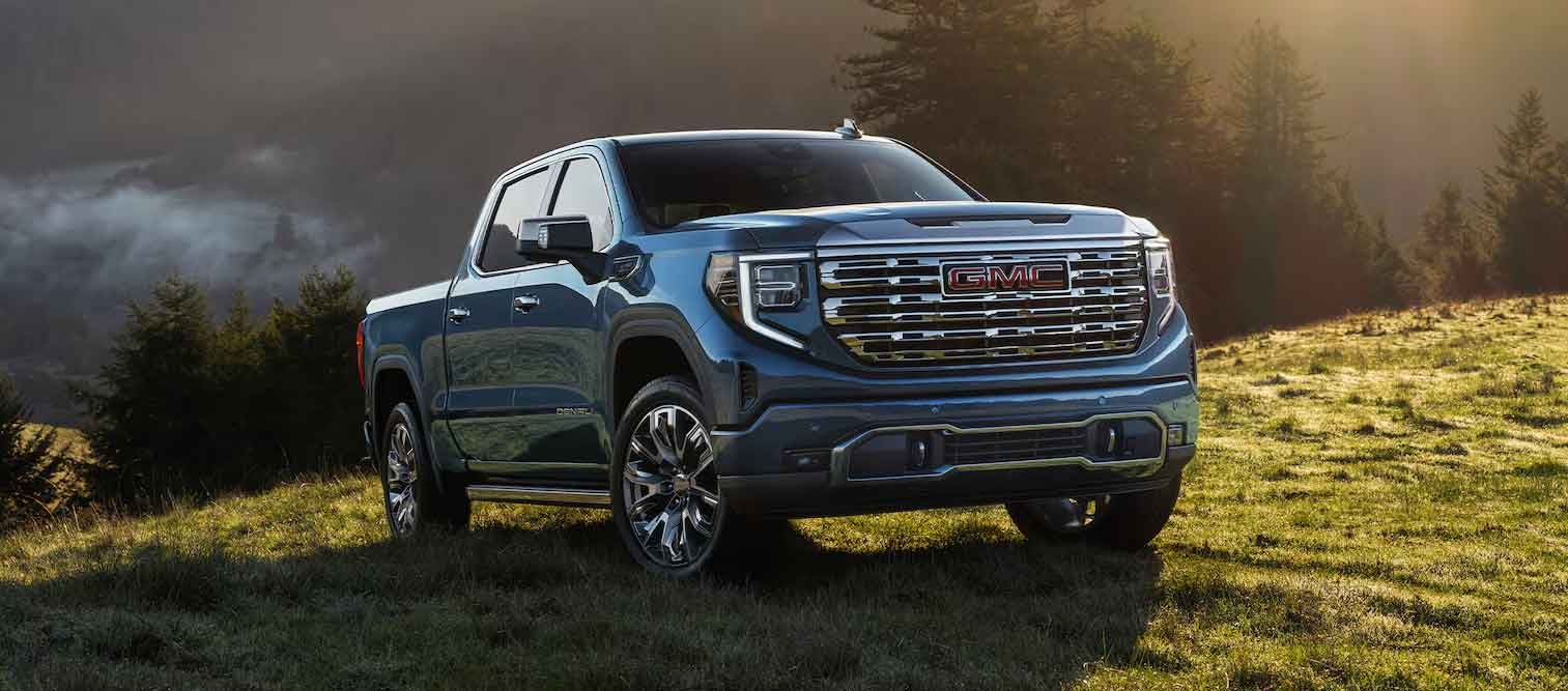 GMC Sierra 1500 in field about to rain