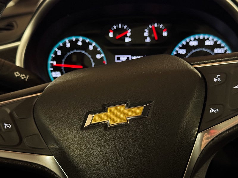 Chevy logo on car steering wheel