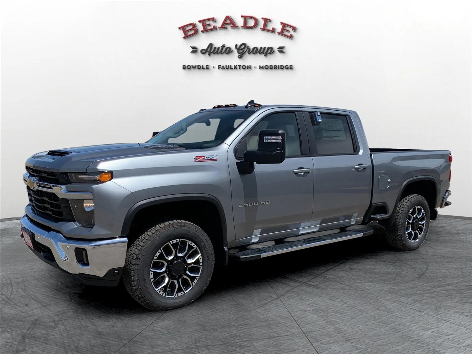 Chevrolet Silverado 2500 HD LT in Sterling Gray Metallic with the Z71 fender badge, photographed on the lot at Beadle Chevrolet GMC in Mobridge