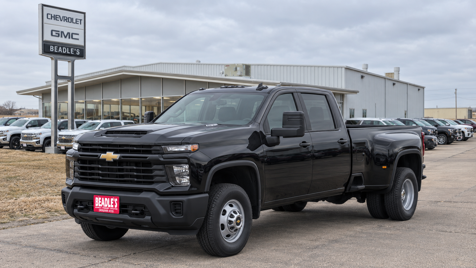 Black Chevrolet Silverado 3500 HD Work Truck dually with a long bed on the front row at Beadle Chevrolet GMC in Mobridge
