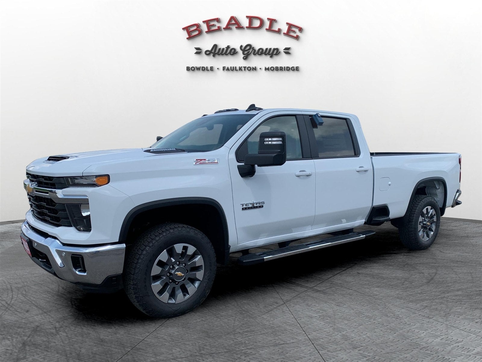The Chevrolet Silverado 3500 HD LT single rear wheel Crew Cab long bed in Summit White on the lot at Beadle Chevrolet GMC in Mobridge