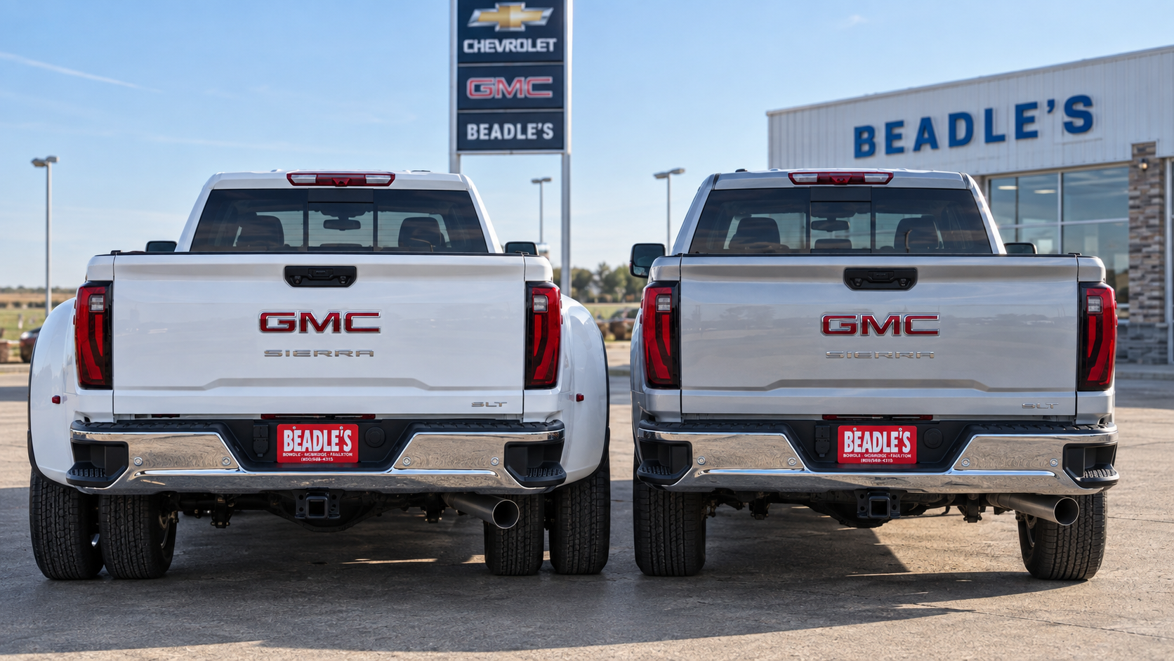 2026 GMC Sierra 3500 HD dually and single rear wheel side by side at Beadle Chevrolet GMC in Mobridge