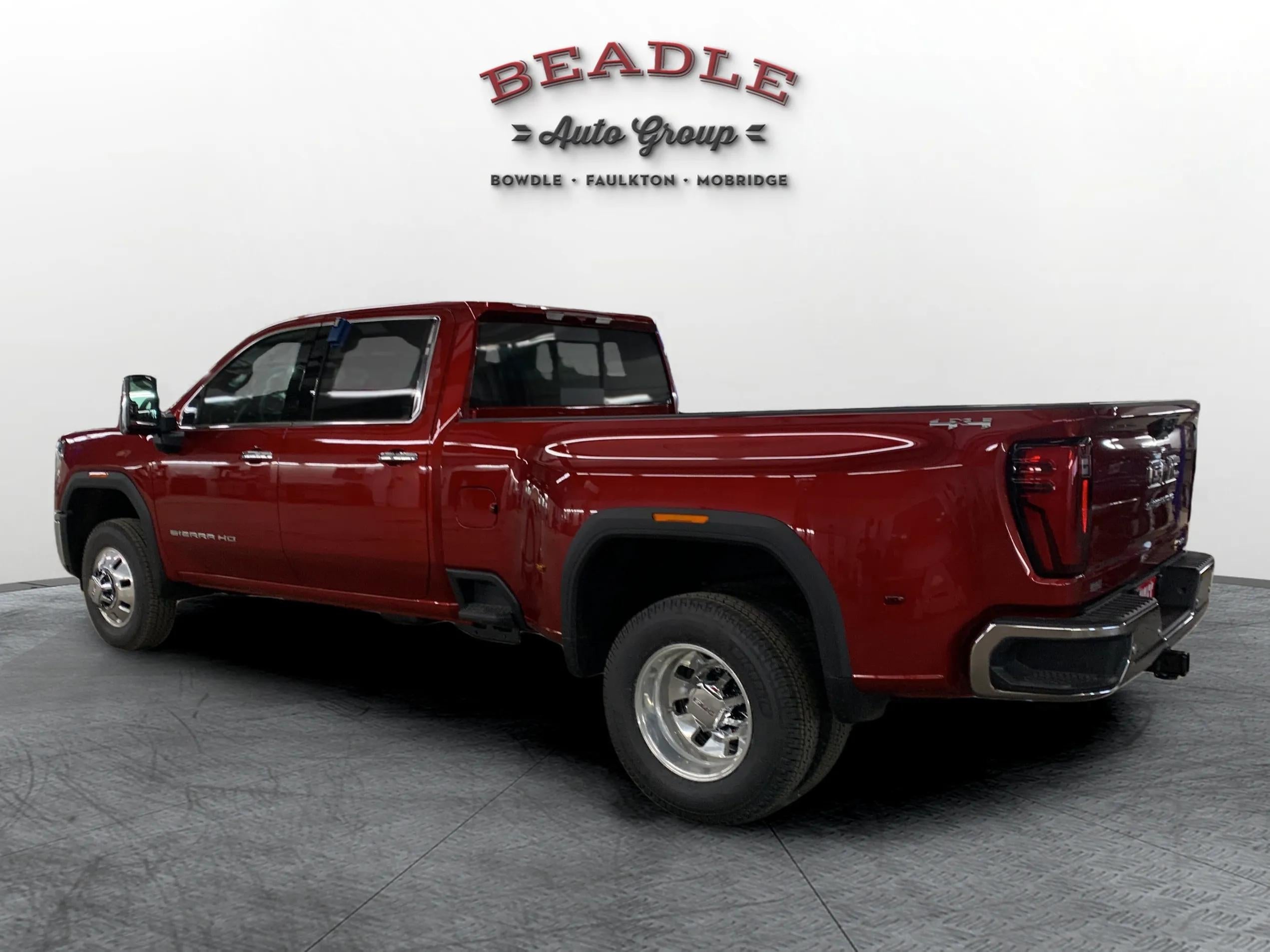 2026 GMC Sierra 3500 HD SLT dually in Volcanic Red at Beadle Chevrolet GMC in Mobridge