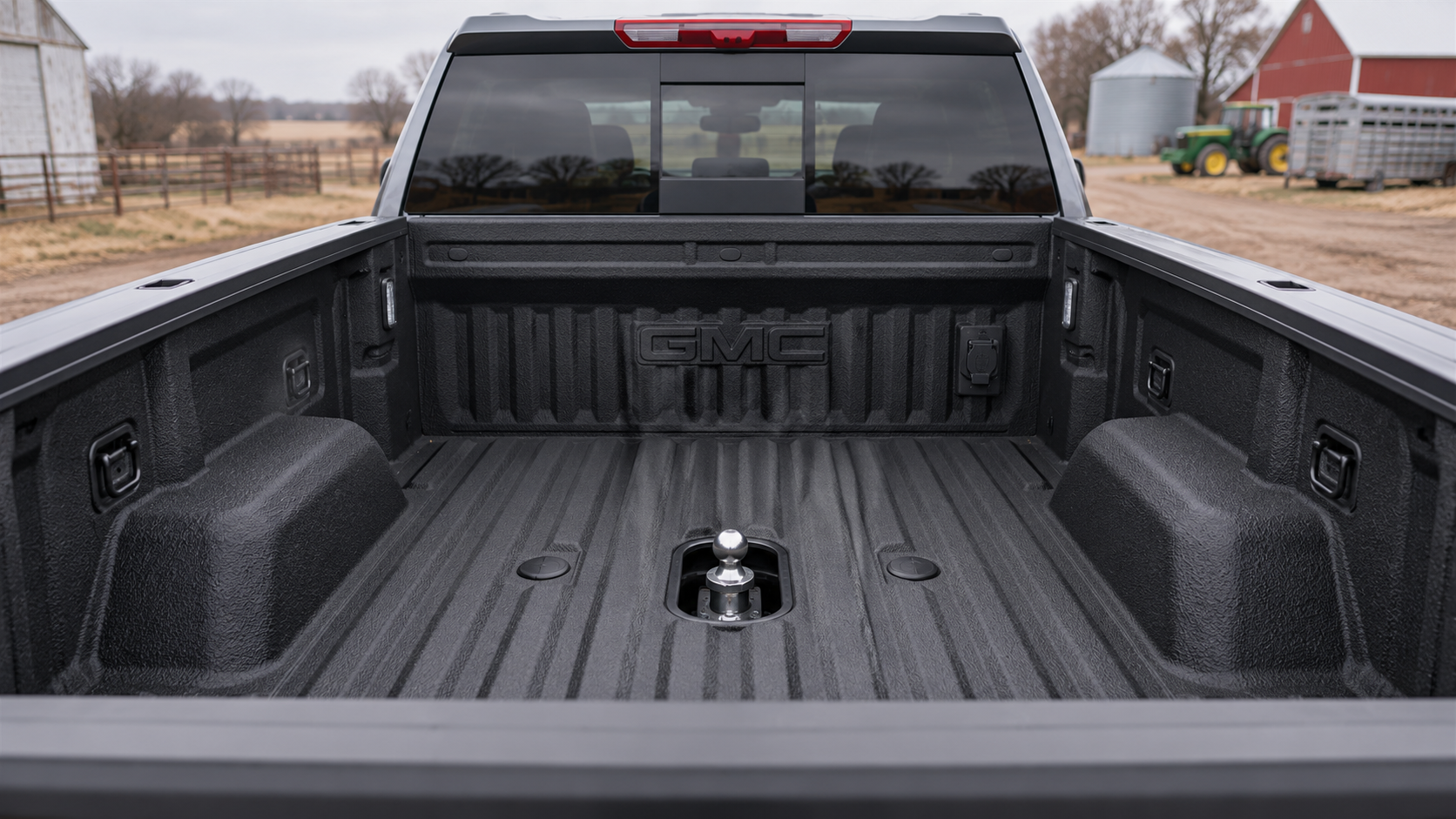 Gooseneck hitch tray and bed connections in a 2026 GMC Sierra 2500 HD SLT with Max Trailering