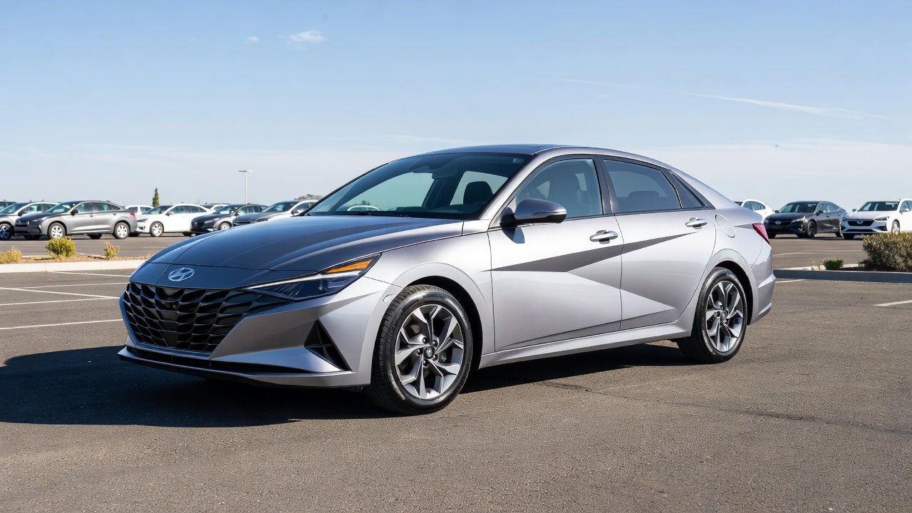 magnific__2026-hyundai-elantra-hybrid-parked-in-a-lot-at-3pm__68537