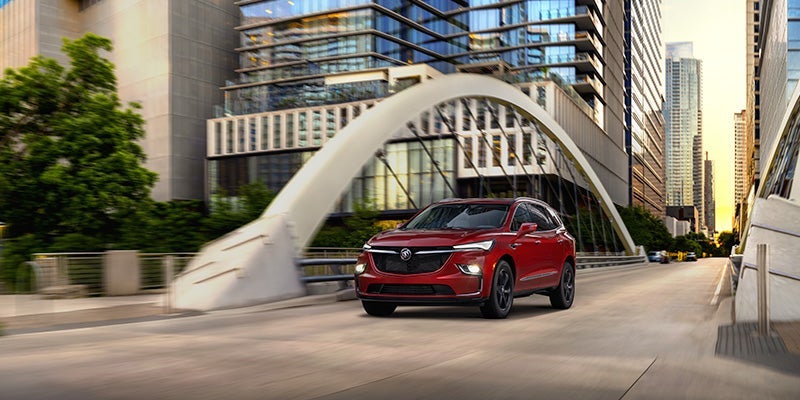 2023 Buick Enclave driving down city road