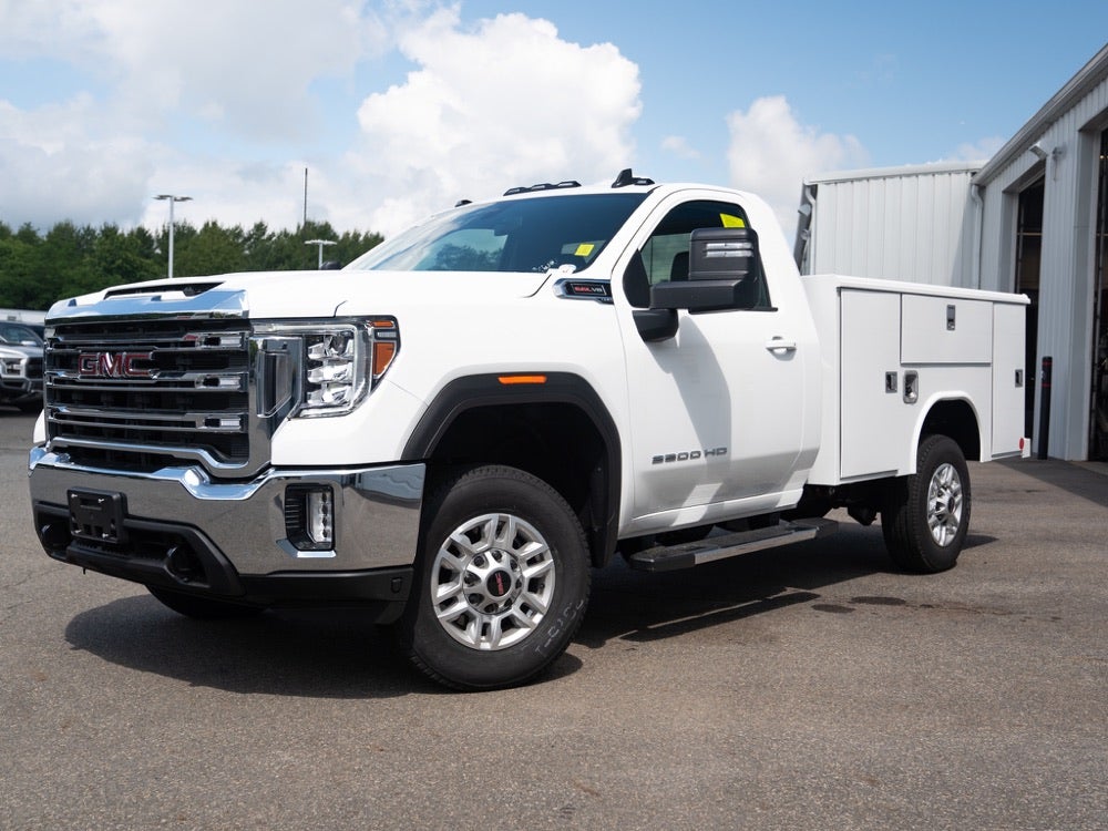 White GMC Sierra HD equipped with a utility service body