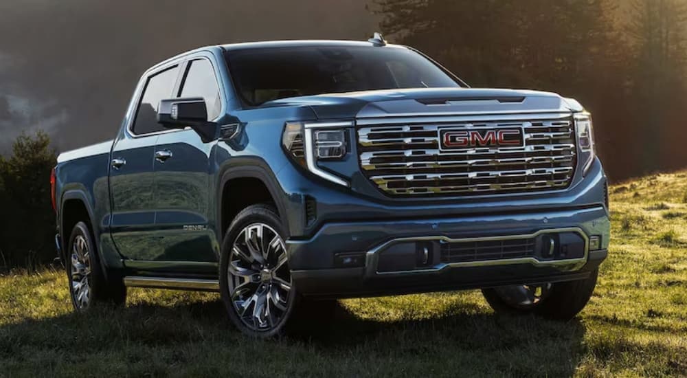 A blue 2025 GMC Sierra 1500 parked for sale near Brooklyn Park