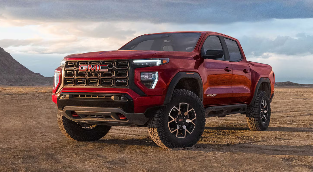 Red 2026 GMC Canyon AT4X parked off road
