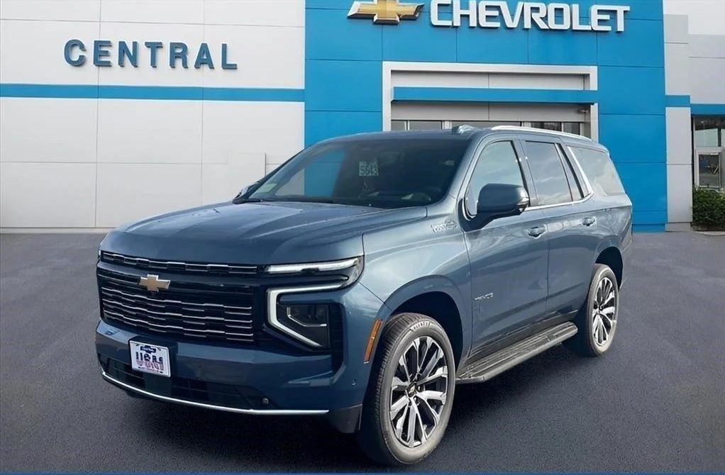 Photo of a blue 2026 Chevrolet Tahoe parked in front of Central Chevrolet.