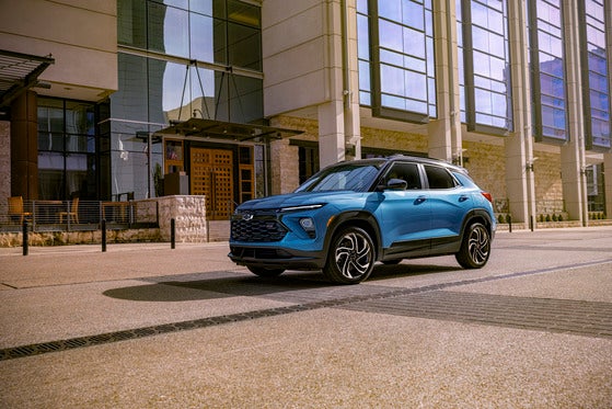 The 2025 Chevrolet Trailblazer RS in vibrant Marina Blue, parked on a city street, ready for urban adventures