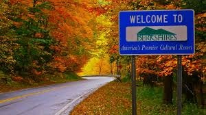 A "Welcome to the Berkshires" sign with scenic mountains in the background.