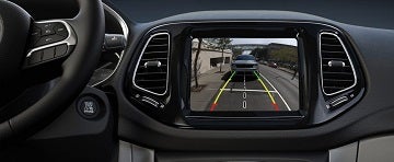 One of the safety features of the 2021 Jeep Compass available at Rhythm Chrysler Dodge Jeep Ram