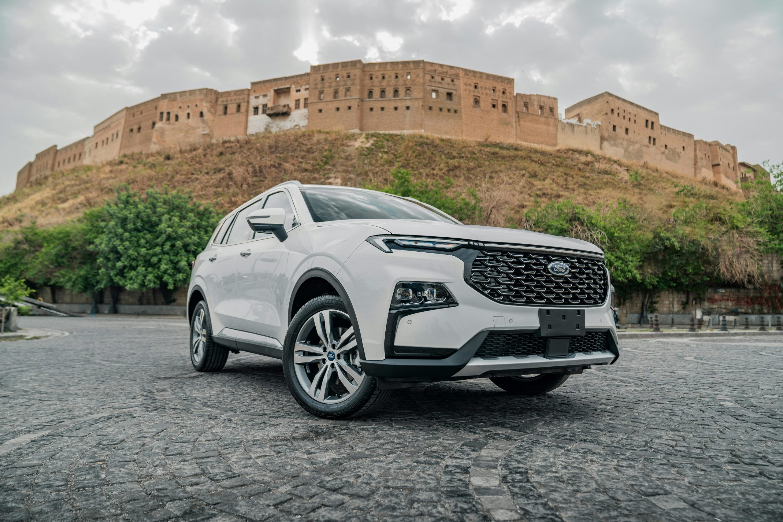Modern Ford SUV in Historic Erbil Setting