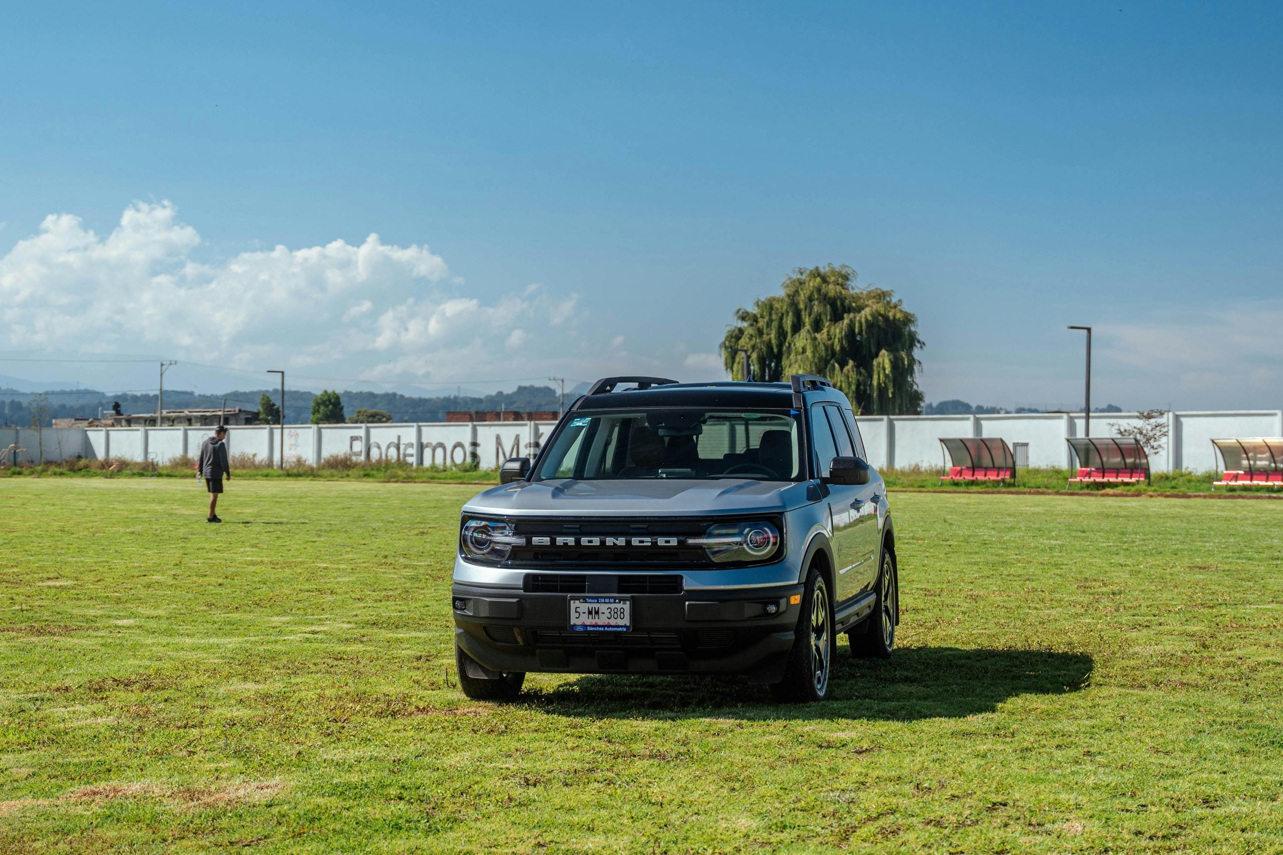 Silver Ford Bronco on Football Pitch