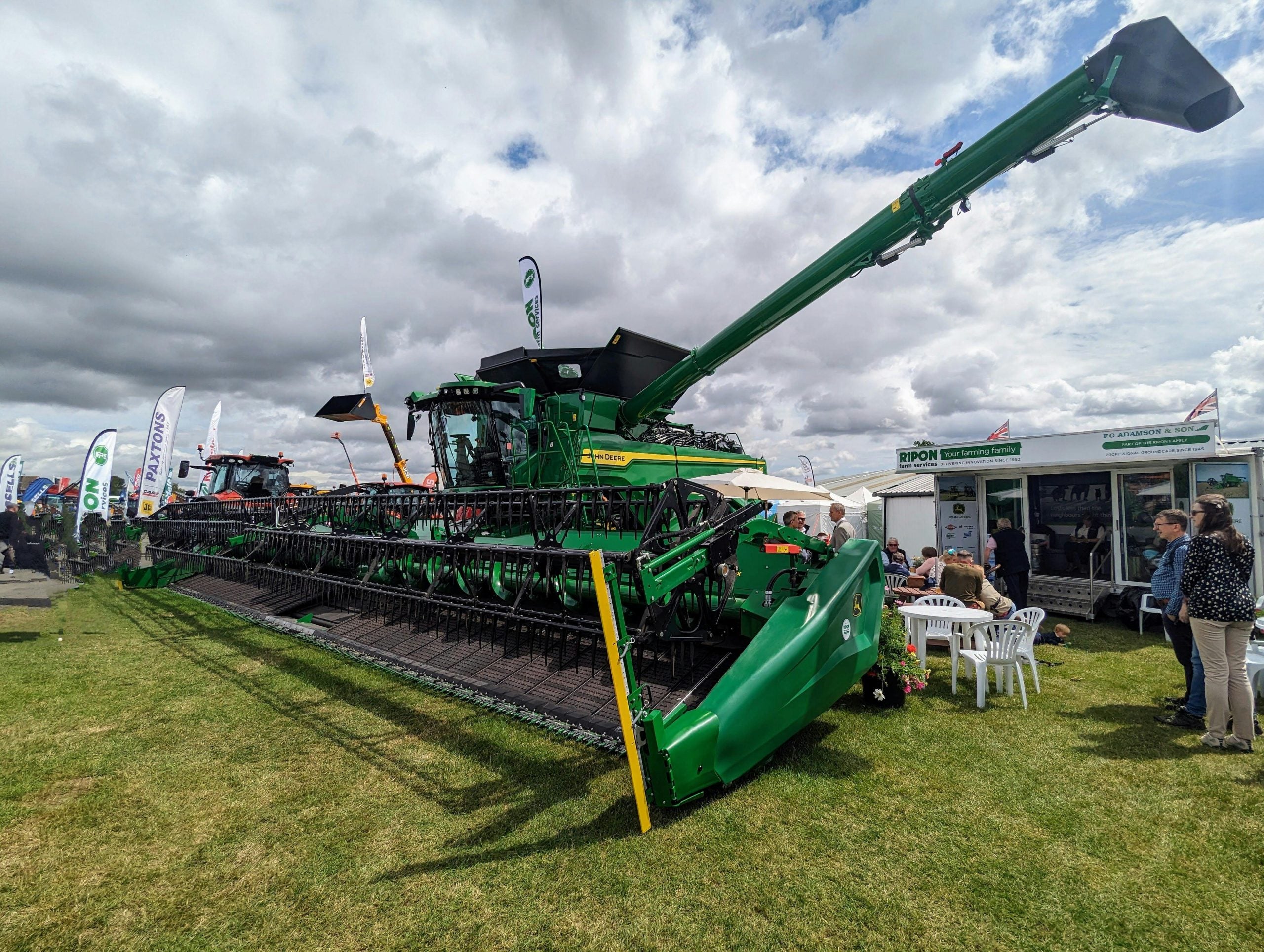 Large Green Combine Harvester at Outdoor Agricultural Show